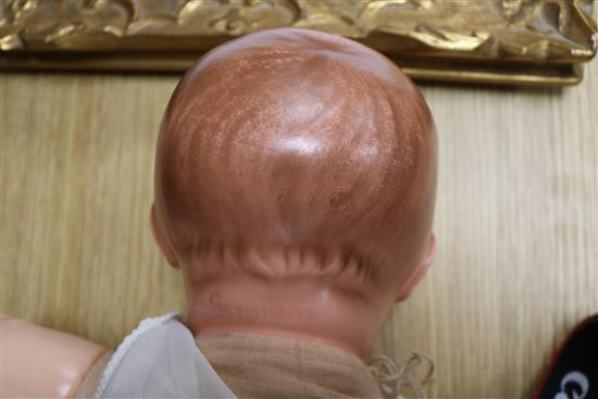 A German composition head and body doll 62cm